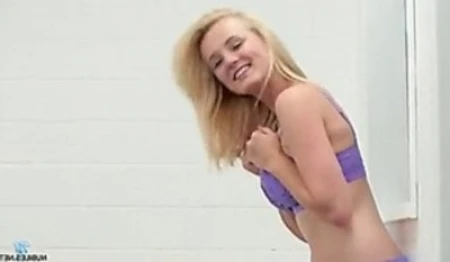 bubbly blonde 19 years old plays with her full round tits and big puffy nipples while a vibrating ring massages clit makes entire body tingle pleasure