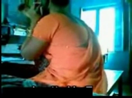orange saree aunty with uncle.
