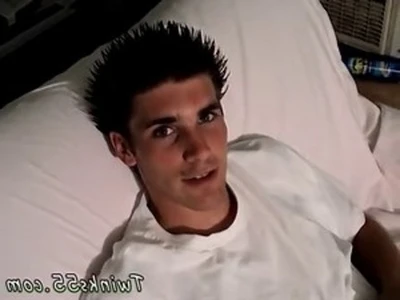 young gay man playfully shoes his feet to the camera