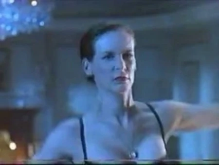 jamie lee stripping, not full nude, but nice. i especially like the way she licks bed post.