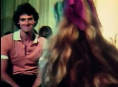retro woman enjoys sexy, short, black, wet