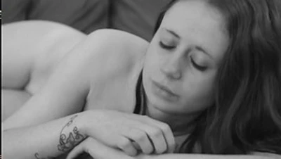 comfy nudes: abby lounges, showcasing tits and tattoo in monochrome perfection