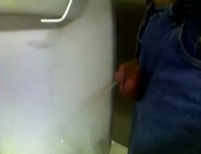 visited a different sam's club in illinois and had to pee. after pissing, i thought i'd jerk of, but another guy came into the bathroom just then.