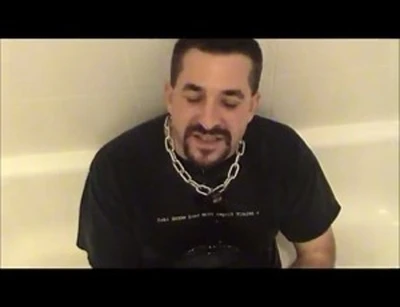 pissing on the while he pisses himself.