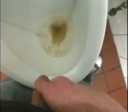 uncut me pissing in public restroom (pulled back foreskin)