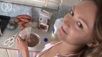 blonde roxie is baking cookies and taking a break to rub
