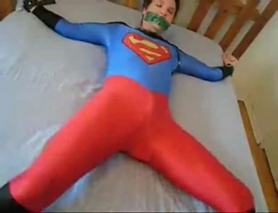 super is weakened by a kryptonite tag and ly bound gagged.